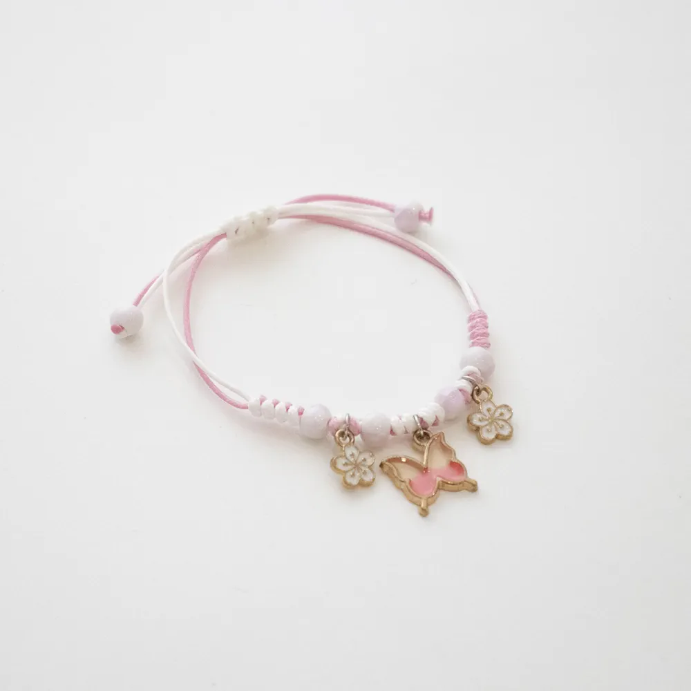 Bracelet cordon Papillon Rose
